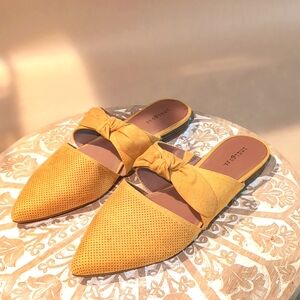 Indigo rd is mustard yellow flats